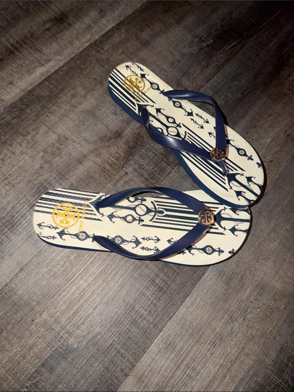 These appear to be the Tory Burch Seafaring Stripe flip-flops Size 11